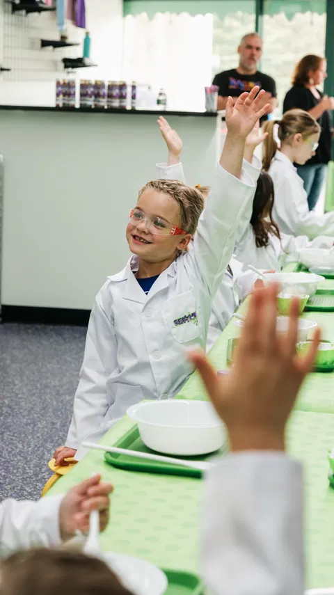 Kids participating in guided science course